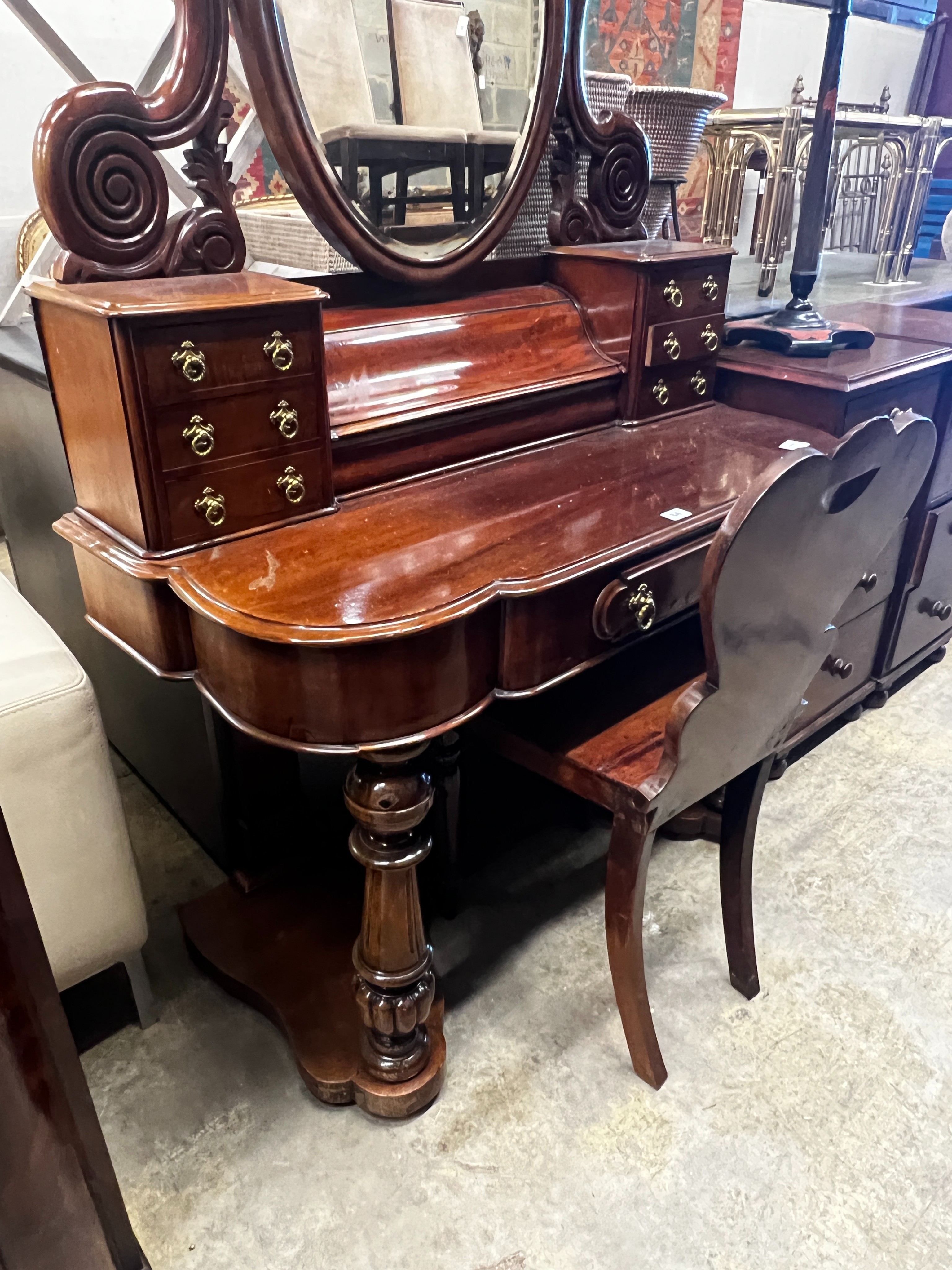 A Victorian mahogany duchesse dressing table, width 104cm, depth 48cm, height 164cm together with a mahogany hall chair